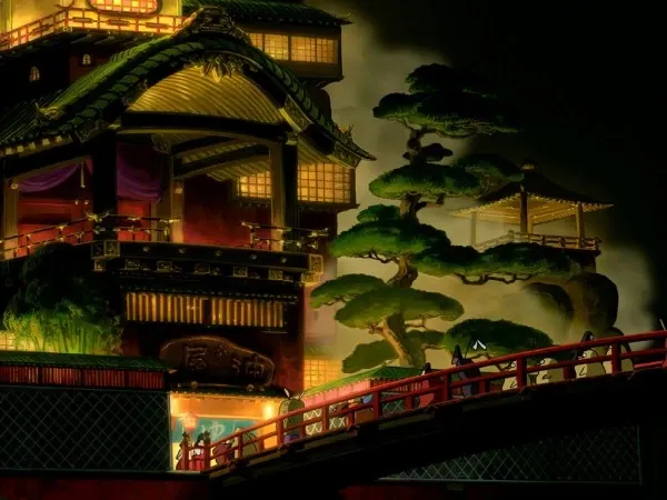 The grand, red bridge leading to the Aburaya bathhouse.
